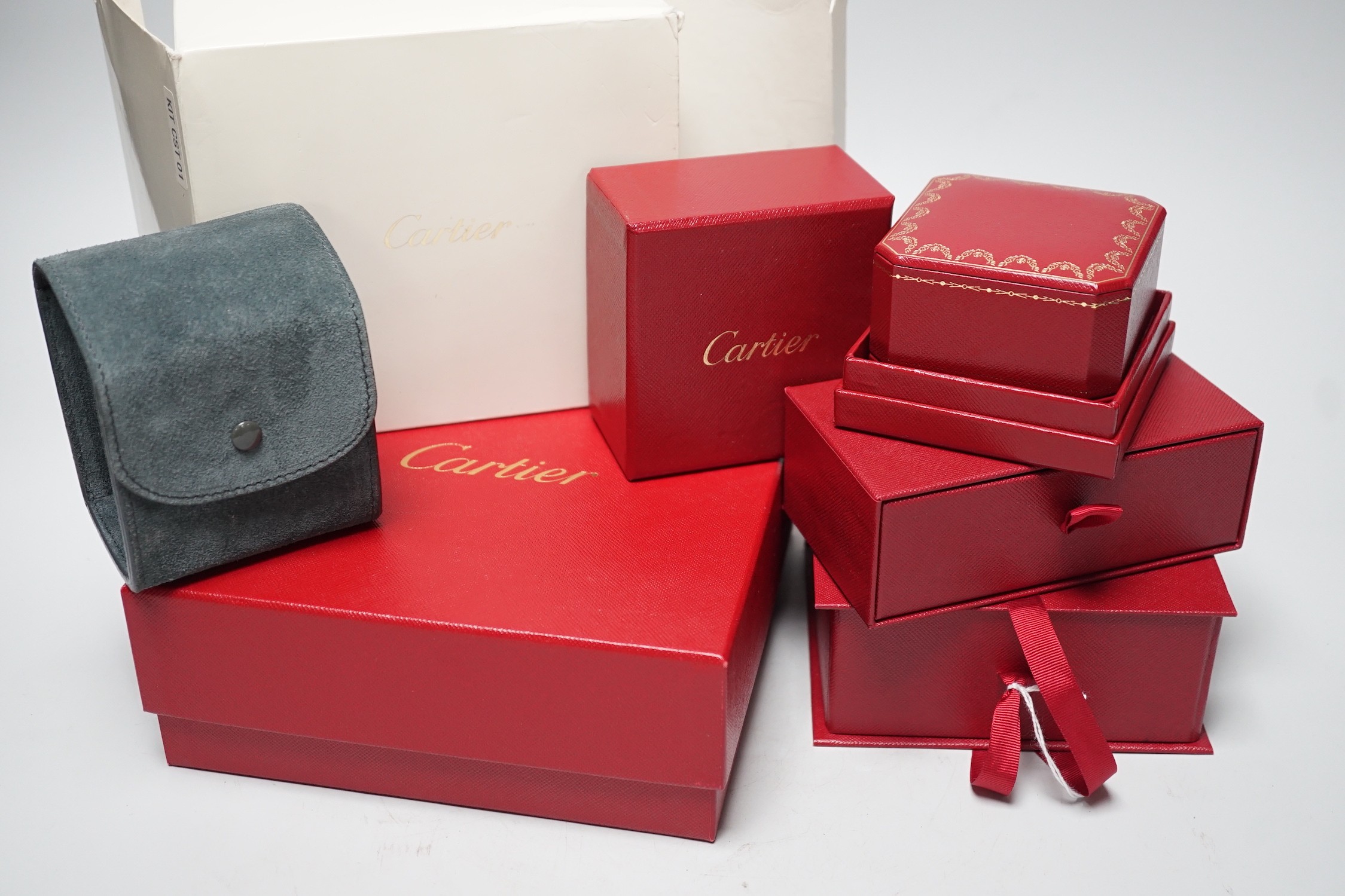 Six various Cartier boxes and Cartier pouches